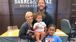Derrick Rose with his wife and kids