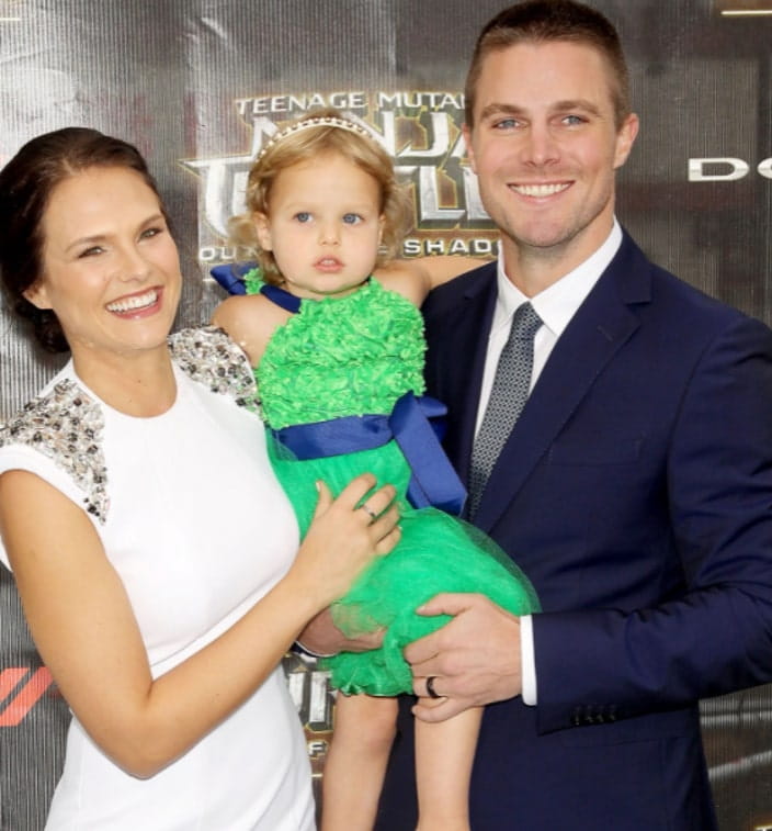 Image of Stephen Amell with his wife, Cassandra Jean Amell and their daughter
