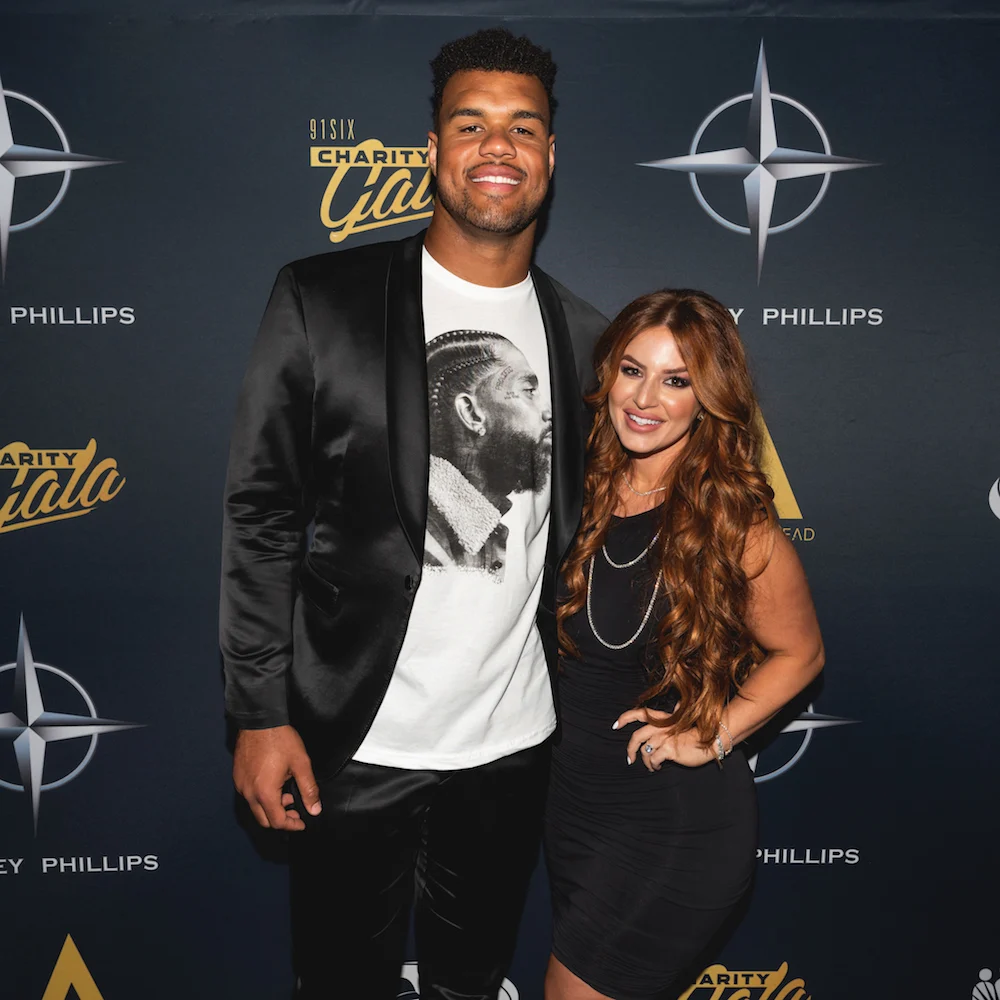 Image of Arik Armstead with his wife 