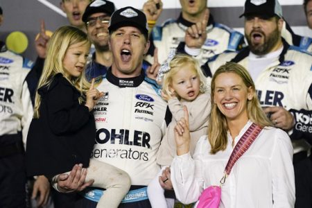 Image of Brad Keselowski and Paige White with their kids