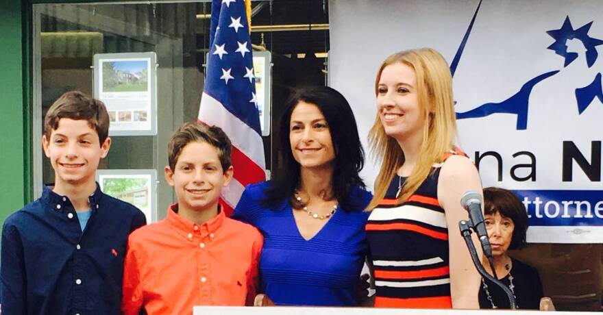 Image of Dana Nessel with her wife, Alanna Maguire, and their kids, Alex and Zach