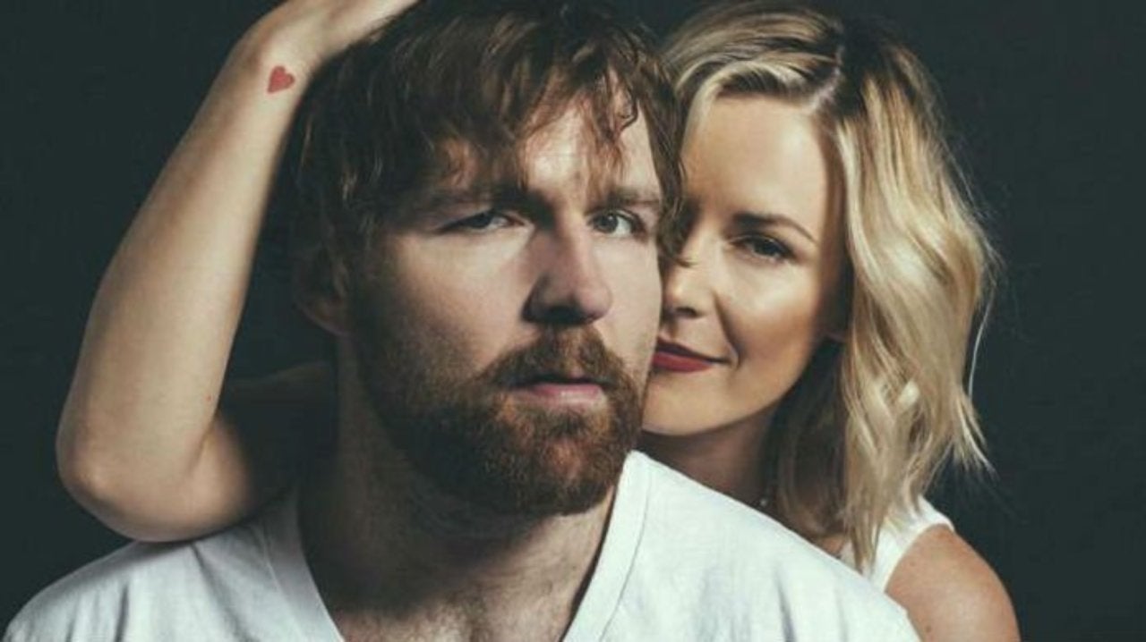 Image of Dean Ambrose with his wife Renee Young, both are WWE personalities 