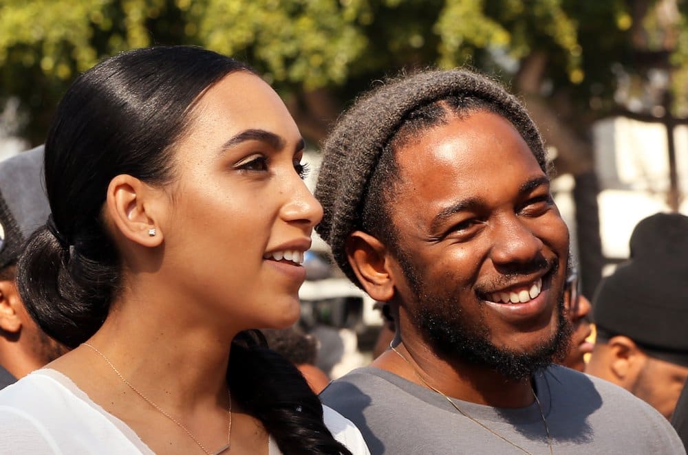 Image of Kendrick Lamar with his fiancée, Whitney Alford