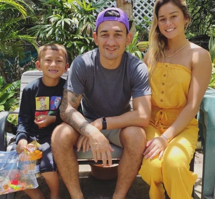 Image of Max Holloway with his wife, Alessa Quizon, and his son, Rush Holloway