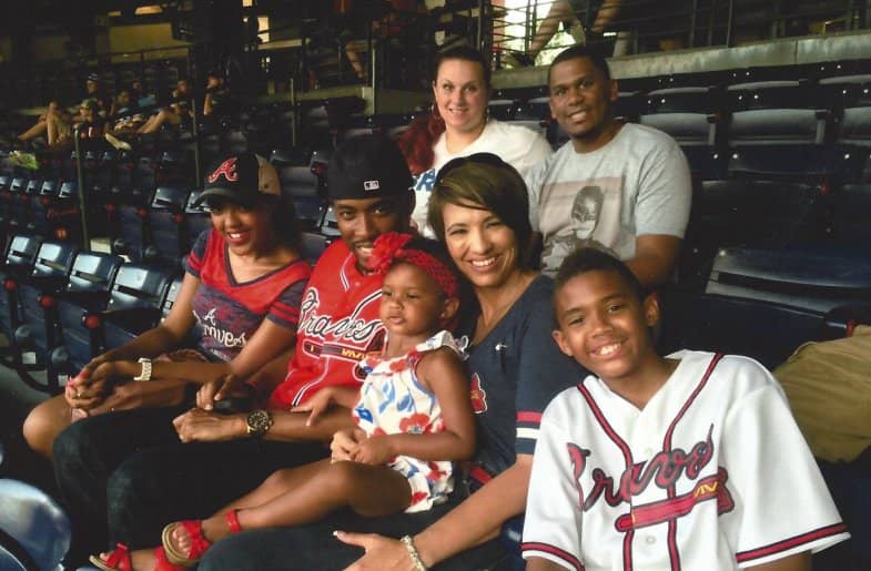 Image of Montell Jordan with his wife and kids 