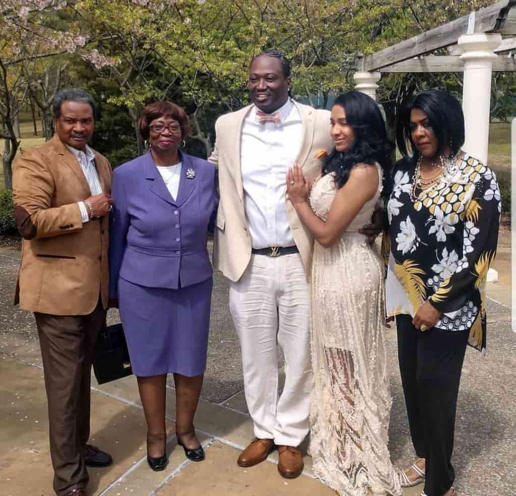 Image of Project Pat with his wife, Alicia Evans-Houston, and parents