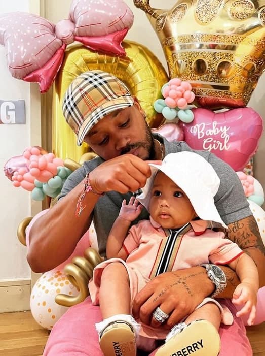 Image of Romeo Miller with his daughter, Baby R.