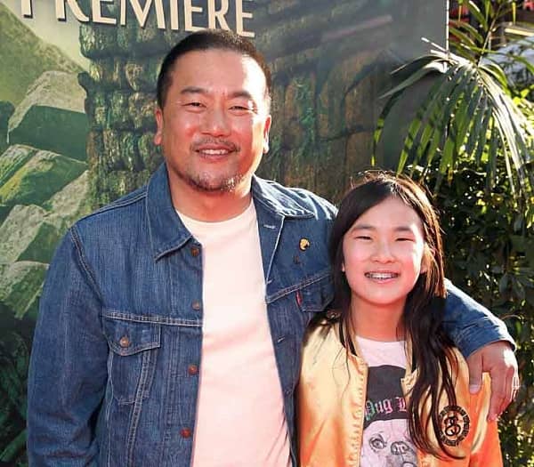 Image of Roy Choi with his daughter 