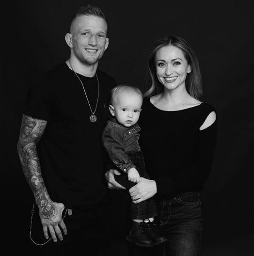 Image of T.J. Dillashaw and Rebecca Dillashaw with their son, Bronson