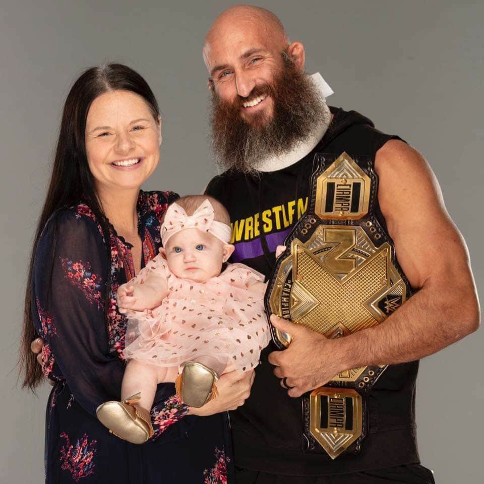 Image of Tommaso Ciampa and Jessie Ward with their daughter, Willow Belle Whitney
