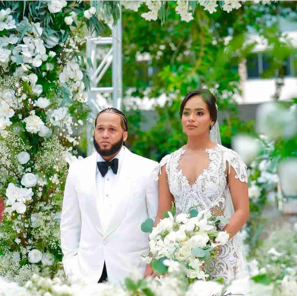 Image of Al-Elfa with his wife Alba Rose at their wedding 