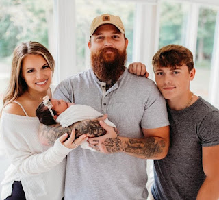 Image of Adam and Tess Riolet Calhoun with their kids, Tamen and Grae Millie Calhoun