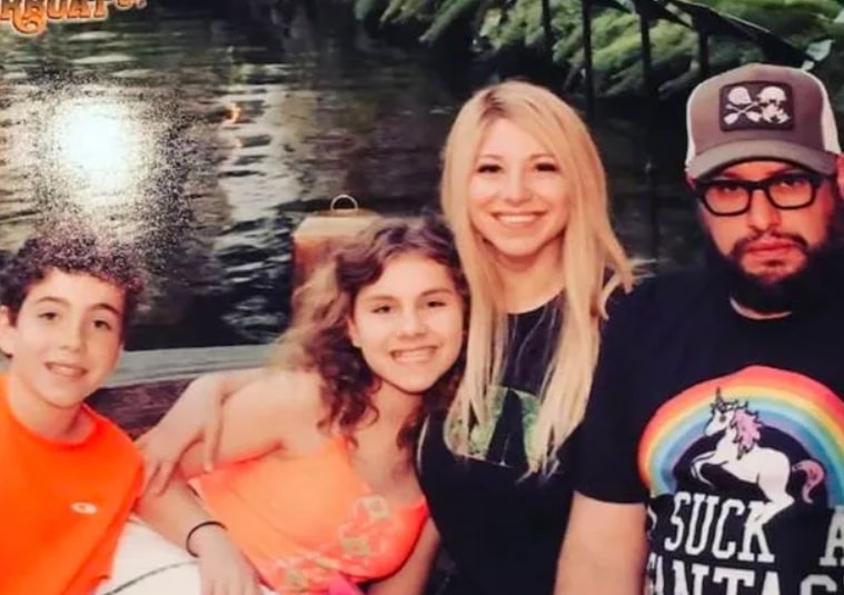 Image of Carl Ruiz with his ex-partner, Marie Riccio, and their kids, Robert and Michelle Kirby