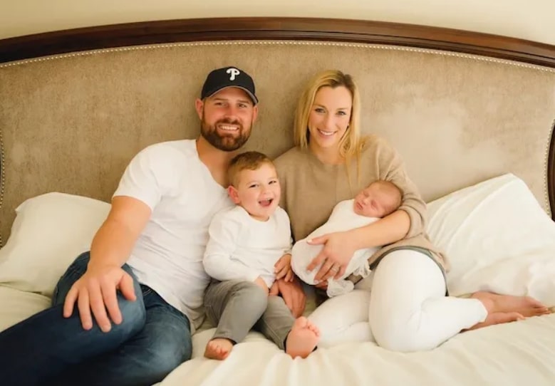 Image of Chad Henne with his wife, Brittany Hartman Henne, with their kids, Chace and Hunter Henne