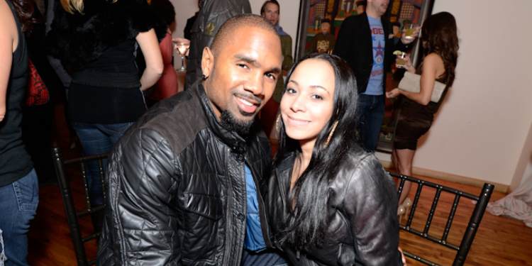 Image of Charles Woodson with his wife, April Woodson 