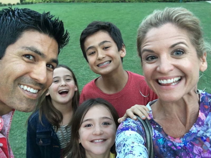 Image of Craig Melton and Glennon Doyle with their kids