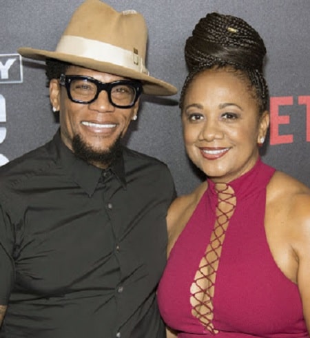 Image of D.L. Hughley with his wife, LaDonna Hughley