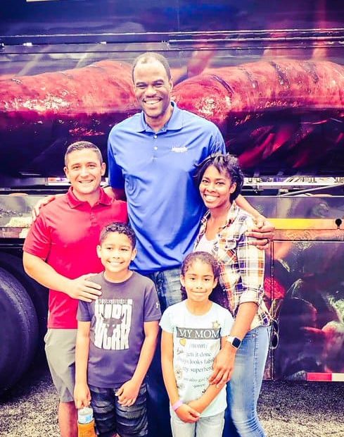 Image of David Robinson with his wife, Valerie Hoggatt, with their kids, David, Jr., Corey, and Justin