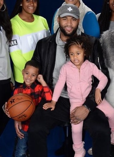 Image of Demarcus Cousins with his kids, Vana and Amir Cousins