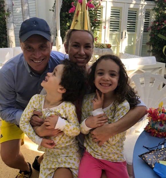 Image of Harold Ford Jr. with his wife, Emily Threlkeld, with their kids, Georgia Walker and Harold Eugene Ford III