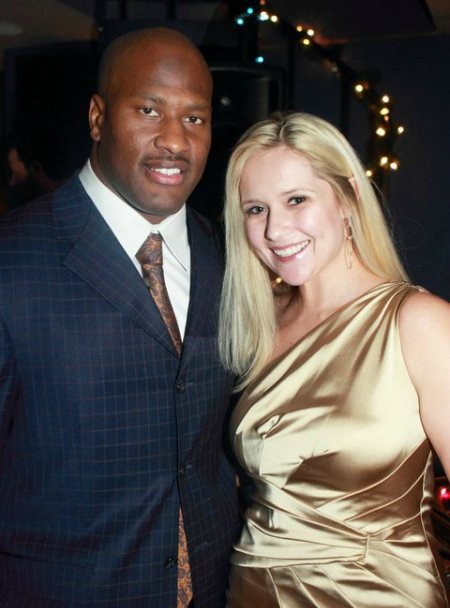 Image of James Harrison with his wife, Beth Tibbott