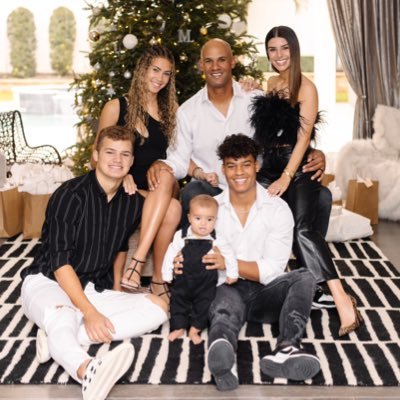 Image of Jason and Monica Taylor with their kids, Isaiah, Mason, and Zoey Taylor