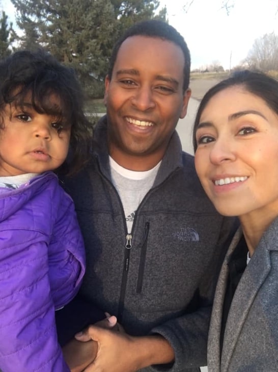 Image of Joe Neguse with his wife, Andrea Neguse, and their daughter, Natalie