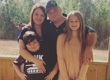 Image of Justin Chiasson with his wife, Amy Chiasson, and their kids