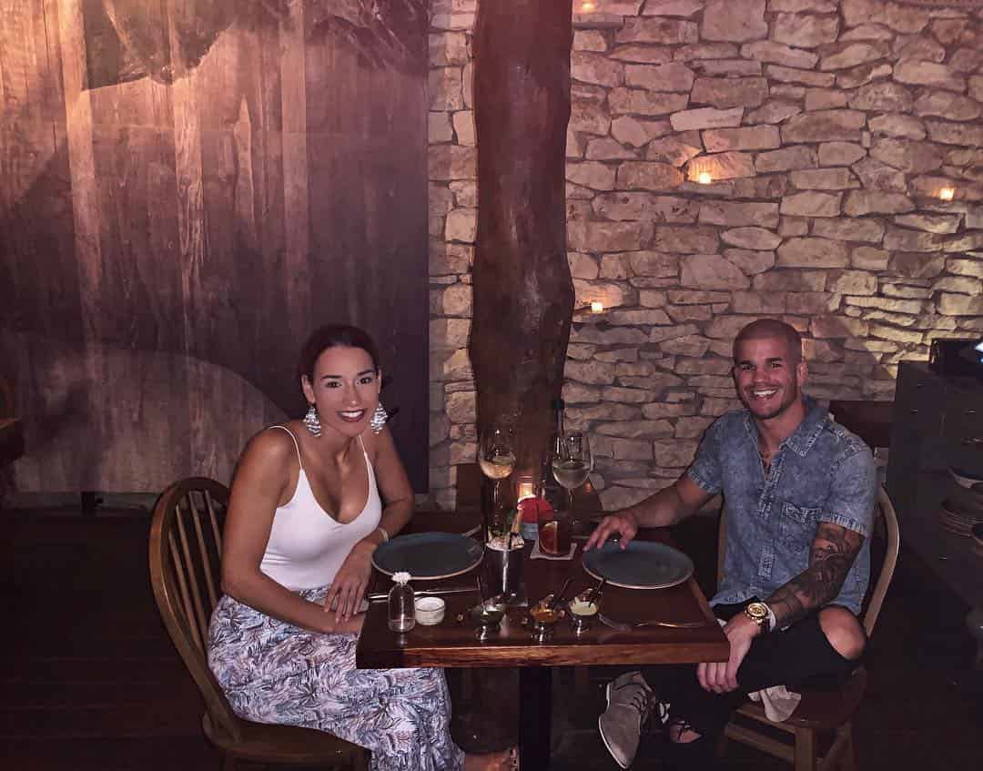 Image of the MMA fighter and Mixed Martial Artist with his wife Jamie Alavarez 
