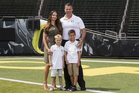 Image of Mario Cristobal with his wife, Jessica Cristobal, with their kids, Mario and Rocco
