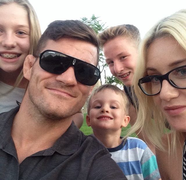 Image of Michael and Rebecca Bisping with her kids, Lucas, Callum, and Ellie.