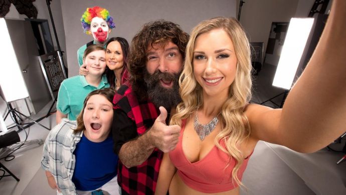 Image of Mick Foley with his wife, Colette Christie, and their kids