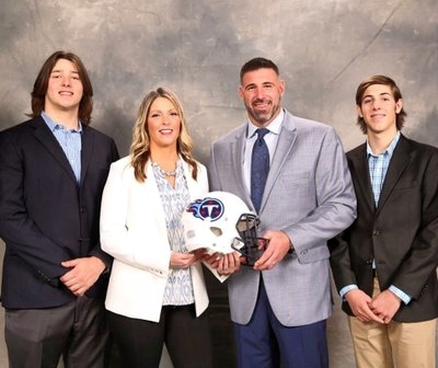 Image of Mike Vrabel with his wife, Jen Vrabel, and their kids
