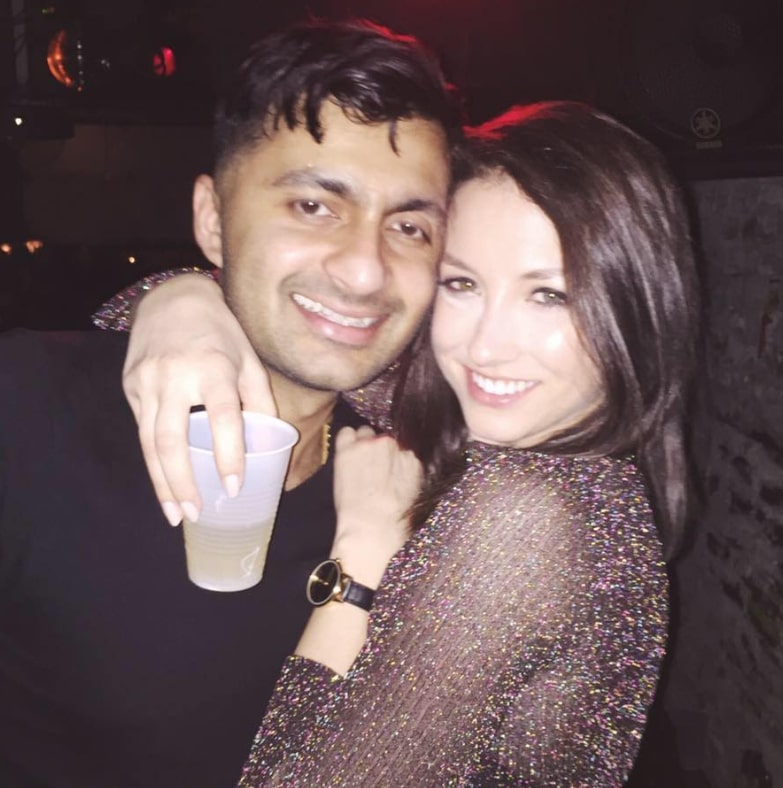 Image of Nimesh Patel with his wife, Amy Havel
