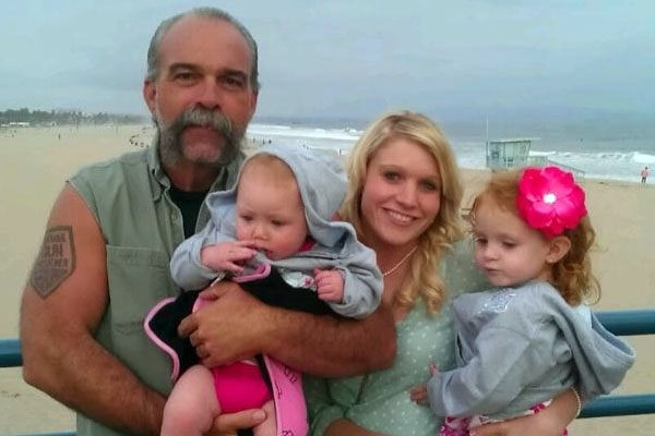 Image of Sam Childers with daughter Paige with Grandkids 