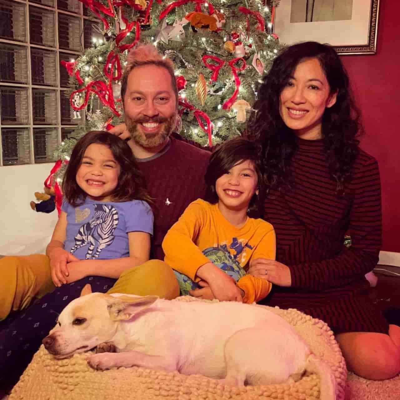 Image of Sam Riegel with his wife, Quyen Tran, and their kids, Maximus and Kestrel