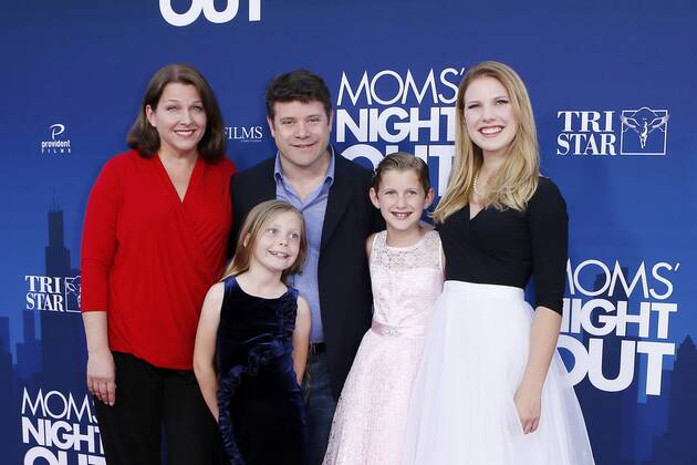 Image of Sean Astin with his wife, Christine Harrell, and their kids