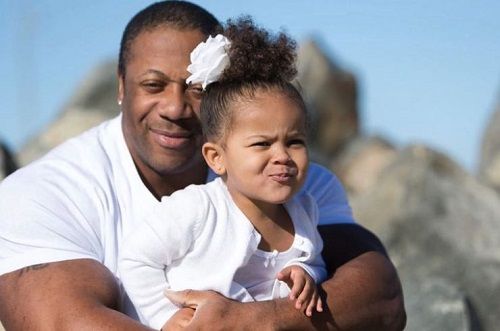 Image of Shawn Rhoden with his daughter, Cora Capri Rhoden