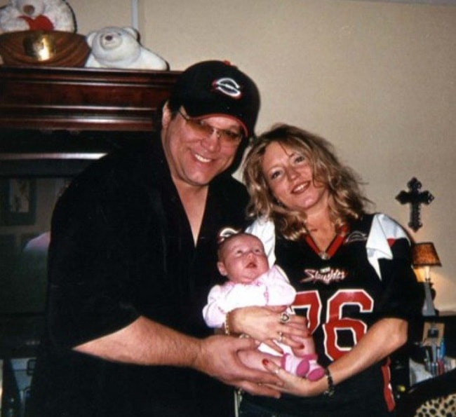 Image of Steve McMichael and Misty Davenport with their daughter, Macy Dale Michael