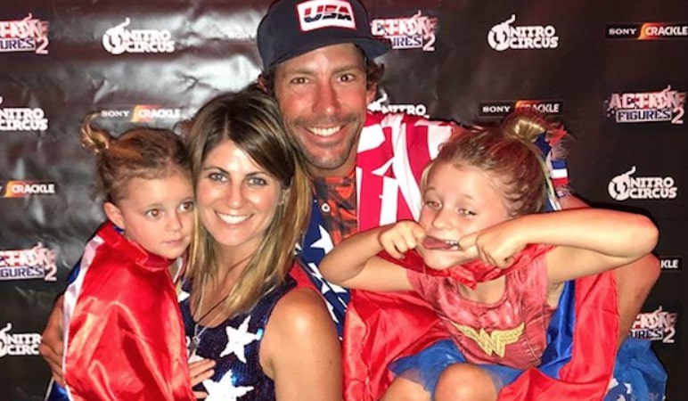Image of Travis Pastrana with his wife, Lyn-Z Adams Hawkins and their kids, Addy Ruth and Bristol Murphy Pastrana