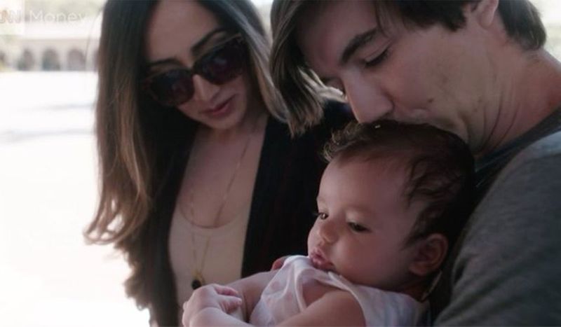Image of Vlad Tenev with his wife, Celina Tenev, with their daughter, Nora Tenev