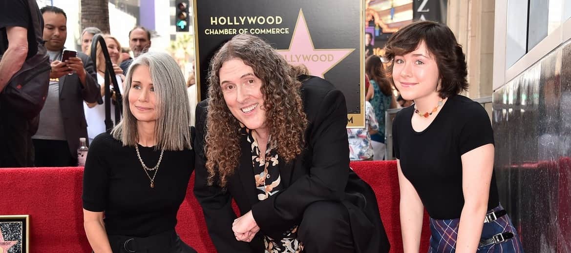 Image of Weird Al and Suzanne Yankovic with their daughter, Nina Yankovic