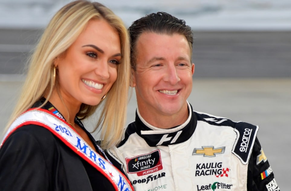 Image of A.J. Allmendinger with his wife, Tara Meador