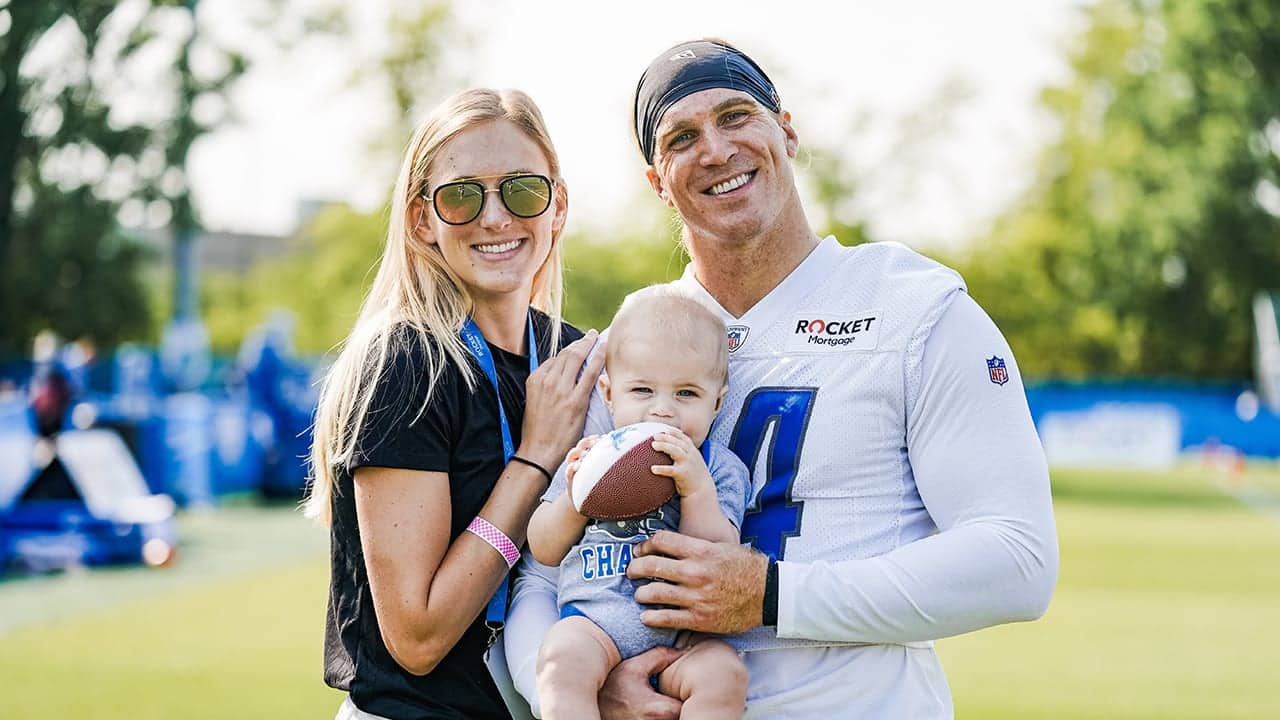 Image of Alex Anzalone with his wife, Lindsey Cooper Anzalone, and their son