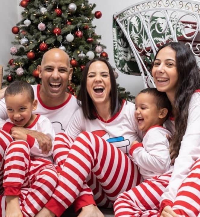 Image of Alex Cora with his wife, Angelica Feliciano, and their kids