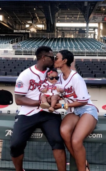 Image of Ricky Vela with his partner, Jade Cargill, and their daughter, Baily Quinn