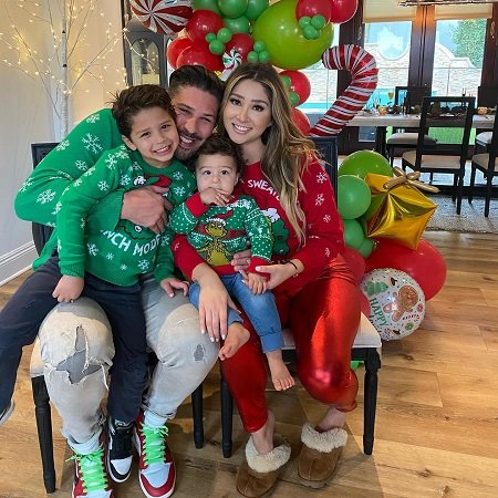 Image of Brendan Schaub with his partner, Joanna Zanella, and their kids, Tiger Pax and Boston