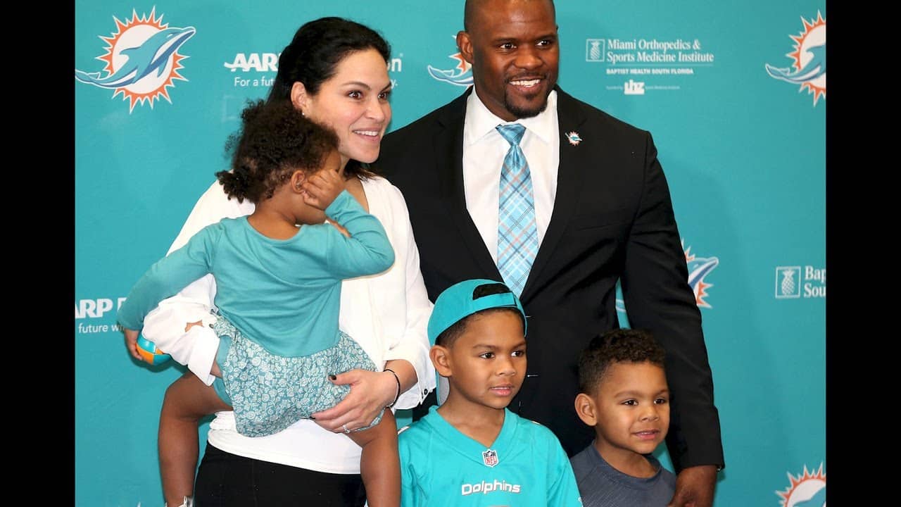 Image of Brian Flores with his wife, Maria Duncan Flores, and their kids