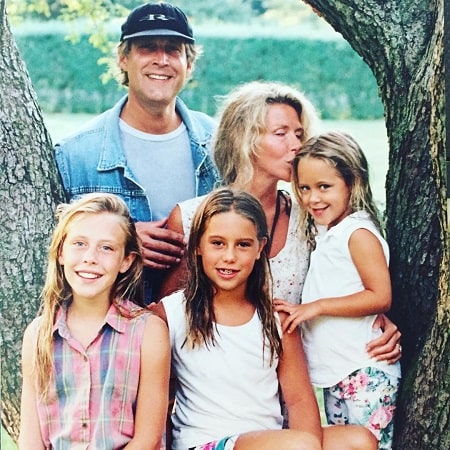 Image of Chevy Chase with his wife, Jayni Chase, and their daughters, Cydney Cathalene, Caley Leigh, and Emily Evelyn Chase