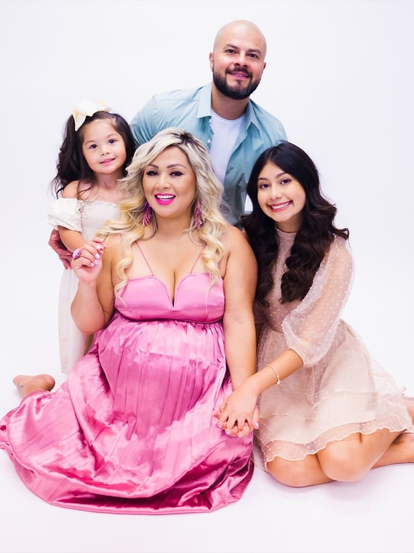 Image of Chingo Bling with his wife, Marisol Herrera, and their kids